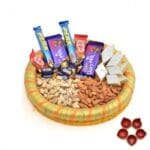 Tray of Different Delectables with Diya