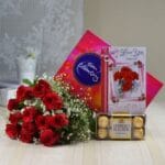 Cadbury Celebrations with 12 Red Roses & Ferrero Rocher